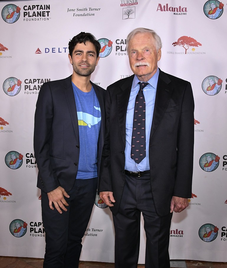 Actor/environmentalist Adrian Grenier, left, and media mogul Ted Turner pose at the Captain Planet Foundation's annual gala on Friday, Dec. 7, 2018, in Atlanta. (John Amis/AP Images for The Captain Planet Foundation)