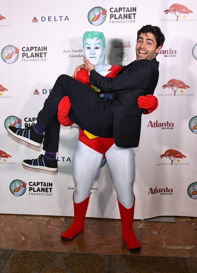 Actor/environmentalist Adrian Grenier poses with "Captain Planet" at the Captain Planet Foundation's annual gala on Friday, Dec. 7, 2018, in Atlanta. (John Amis/AP Images for The Captain Planet Foundation)