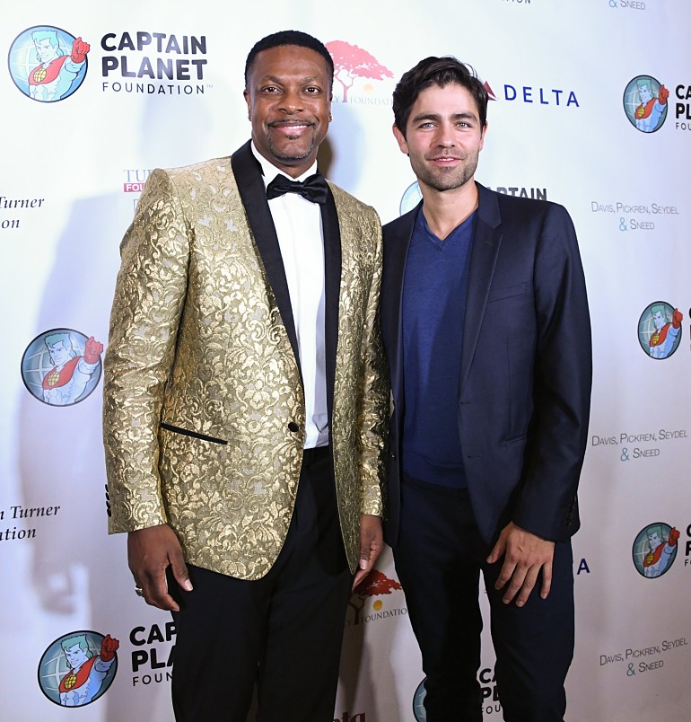 Actor/comedian Chris Tucker and actor/environmentalist Adrian Grenier, right, pose at the Captain Planet Foundation's annual gala on Friday, Dec. 7, 2018, in Atlanta. (John Amis/AP Images for The Captain Planet Foundation)